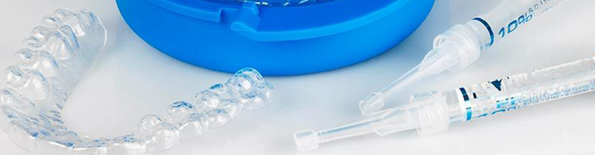 whitening gel syringes and tray beside case